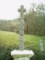 A BRENAC (D78 entre SAINTE GENEVIEVE et LACALM) sur la route d'ALPUECH. Remise rcemment en tat elle est encore plus magnifique. Noter la qualit de gravure de la colonne et son serpent bien visible, les deux personnages au pied et la grappe de raisin?.